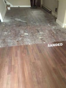 brazilian-cherry-stained-wood-floor-during-sanding