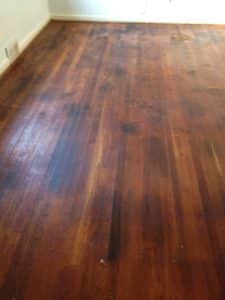 wood-plank-floor-before-refinishing