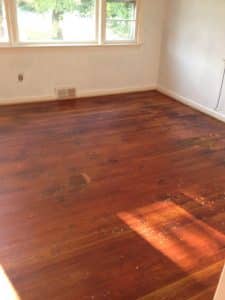 wood-plank-floor-before-refinishing