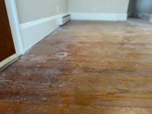scratched-and-damaged-wood-floor-before