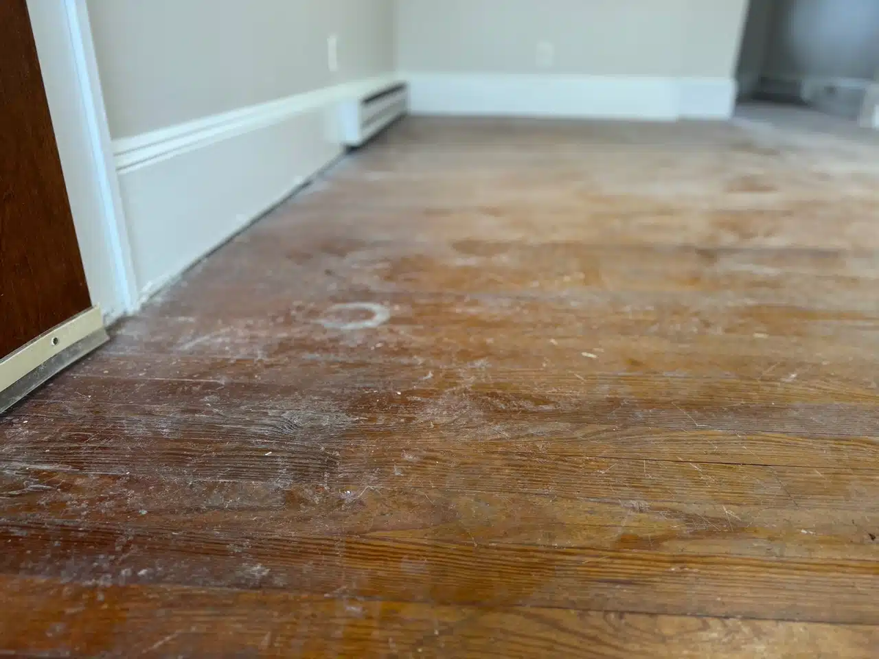 scratched-and-damaged-wood-floor-before